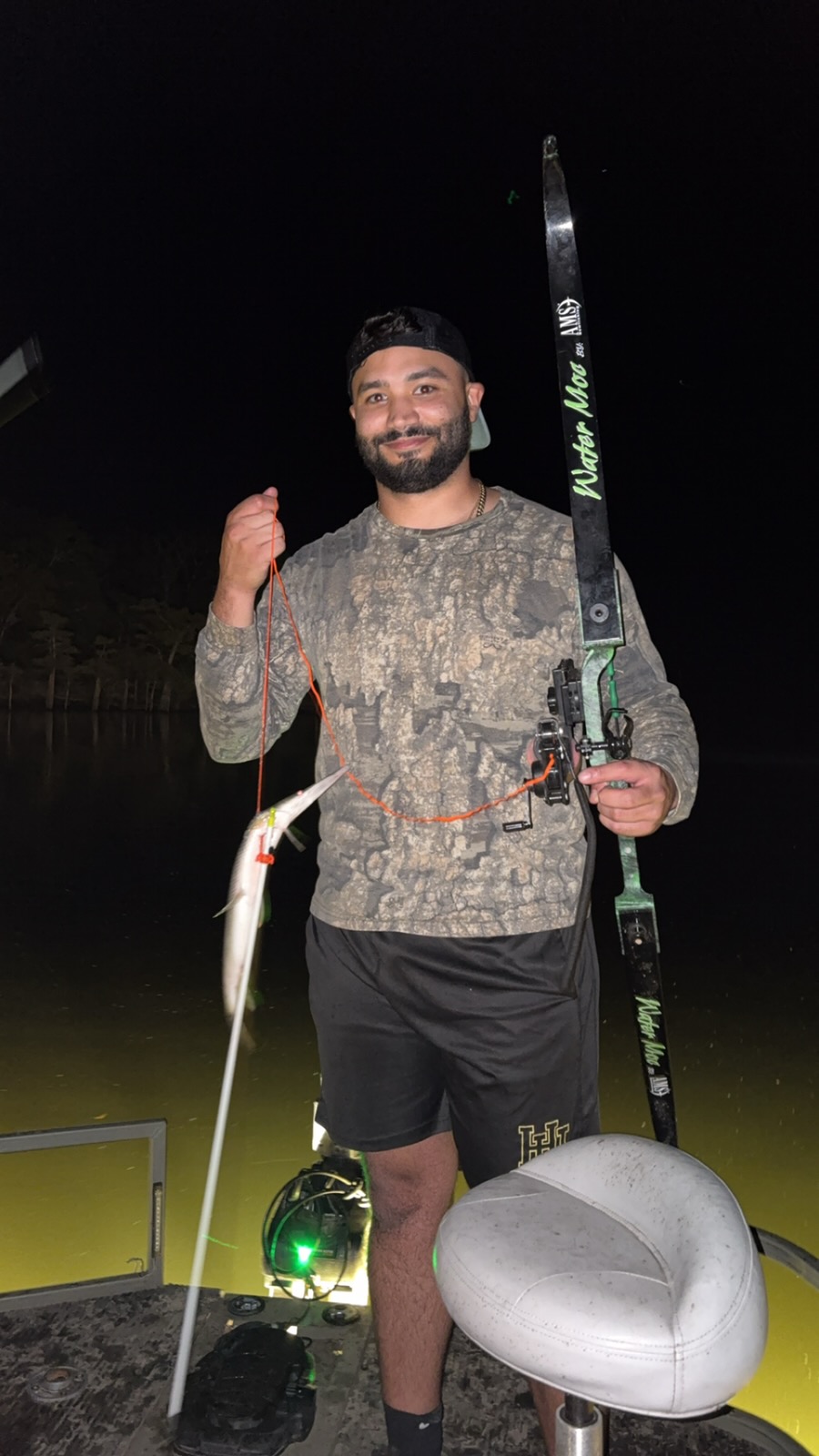 Night bowfishing action